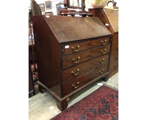 Edwards and Roberts - An early 20th century mahogany bureau, the fall front revealing fitted interior over four graduated coc