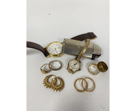 A 14ct gold wedding band, a yellow and white metal eternity style wedding band (unmarked), a 9ct gold signet ring, an 18ct go