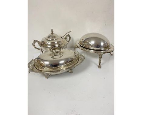 A Continental Epns circular two handled soup tureen with flame finial complete with scroll handles on splay feet (21cm x d.26