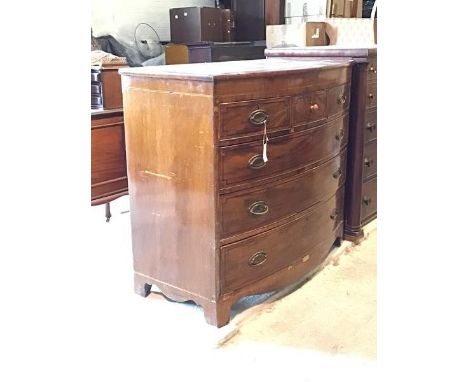 A 19thc bow front mahogany chest of drawers, with three short drawers above three graduated drawers, on shaped bracket feet (
