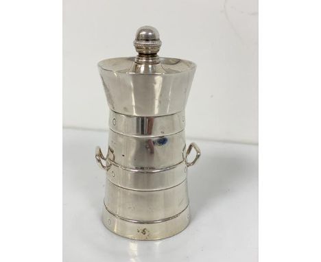 A silver Capstan style pepper grinder in the form of a barrel with twin handles to side, on circular moulded base (including 