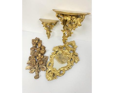 A Florentine style giltwood wall bracket, one section missing (30cm x 27cm), a smaller similar carved Florentine wall bracket