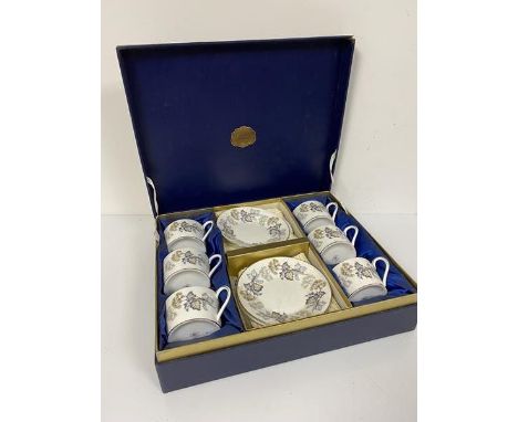 A Coalport Camelot pattern coffee set including six cups, six saucers, in original fitted box
