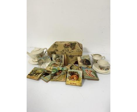 A tapestry covered dome style casket, a collection of children's learning blocks with animals, birds, butterflies, insects et