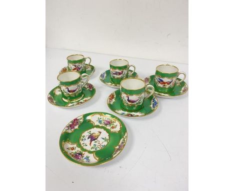 An eleven piece apple and bee mark Worcester style coffee set comprising five coffee cans and six saucers, all decorated with