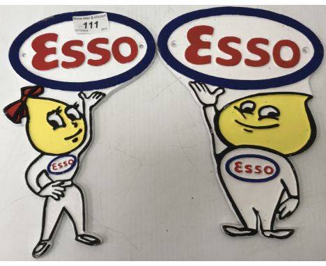 A modern painted cast iron sign depicting "The Esso lady", 25 cm high and another featuring "The Esso man", 25 cm high (2)