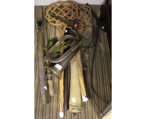 A selection of collectable domestic items to include carpet beaters, hunting horn, bugle, etc