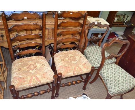 A pair of Victorian fancy backed single chairs, together with two ladder backed single chairs