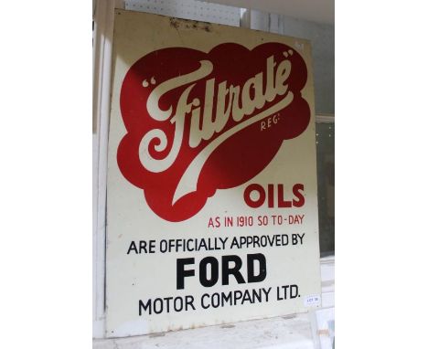 An enamel on tin "Filtrate oils" sign