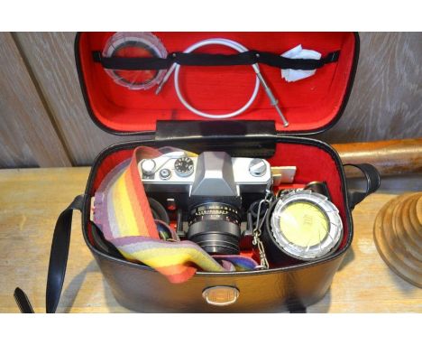 Cased Mamiya/Sekor SLR camera with accessories