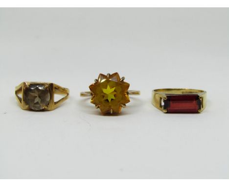 Three vintage 9ct rings set with garnet, hessonite and yellow topaz, 8.2g total (3) 