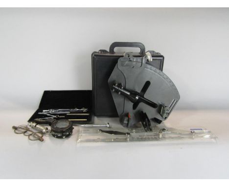 A collection of scientific and engineering instruments to include a cased plastic sextant, a military pocket compass, further