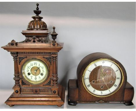 Continental walnut architectural mantle clock enamelled chapter ring with Arabic numerals and twin train movement, pendulum a