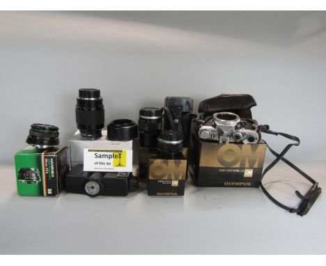 A mixed lot comprising a selection of vintage camera equipment and a collection of silver plated flatware 