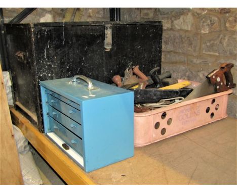 A vintage dark stained wooden tool chest and contents to include carpentry and other hand tools, together with a small blue p