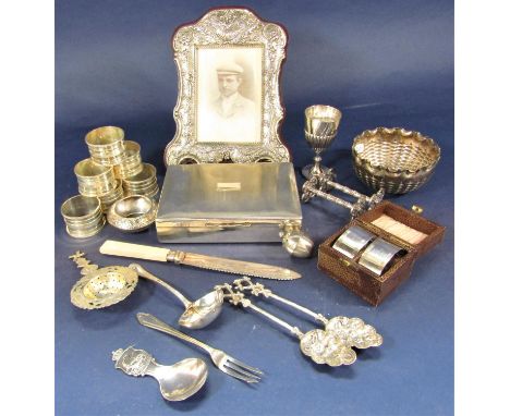 Good embossed silver plated rococo style photo frame, with a collection of silver plated flatware, six napkin rings etc (coll