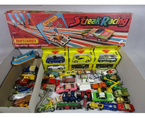 Collection of model vehicles including 6 boxed Shell sports cars, a  Lone Star N gauge locomotive D5900, unboxed cars, motorc