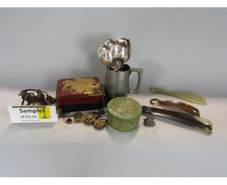 A mixed lot containing a collection of silver plated flatware, a Victorian diorama with foliage and butterflies, a lacquered 