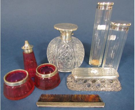 A collection of silver and glass dressing table items comprising good cut glass oval silver topped scent jar, the hinged lid 