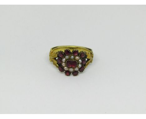 Georgian yellow metal ring set with garnets and seed pearls, size K/L, 3.6g 