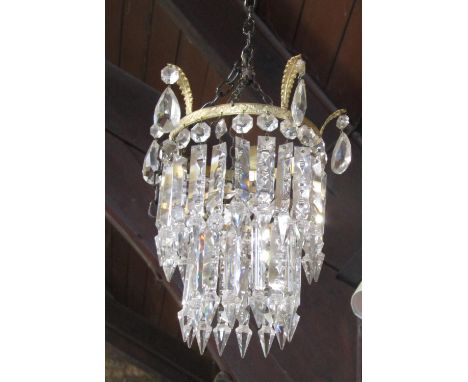 Four good antique prismatic glass drop light fittings, the largest 50 cm high (4)