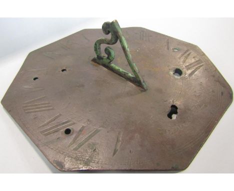 An 18th Century octagonal sundial with engraved detail signed Hedger London 20cm 