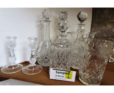 A large collection of mainly cut glass to include tumblers, rummers, ice bucket, decanters, etc (a shelf full) 