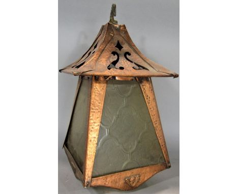 Arts and crafts planished copper lantern, with cast maiden heads, etc, 45cm high 