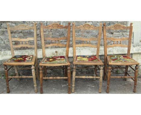 A set of four Edwardian stained beechwood dining/occasional chairs with carved cresting rails, over later colourful Kelim sty