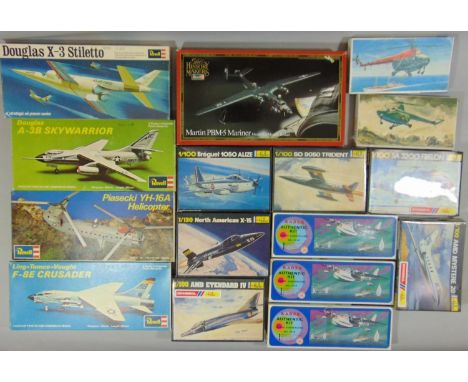 A collection of various scale model aircraft kits including kits by Revell, Heller, VEB and Kadar, all unchecked and un-start