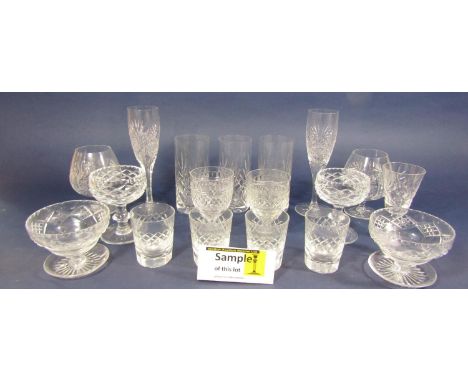 A large collection of cut glass vessels to include champagnes, rummers, tumblers, etc (a shelf full) 