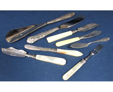 A collection of silver and silver plated pearl handle cutlery to include butter knives and others together with a silver hand