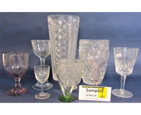 A large collection of various glassware to include amethyst glass rummers, champagnes, unusual large glass goblets and others