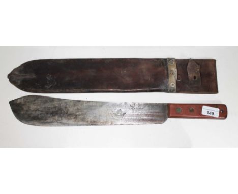 A WWII Josh Beal &amp; Sons machete with wooden handle and leather scabbard, length of blade 37.5 cm, handle approx 13 cm.  R