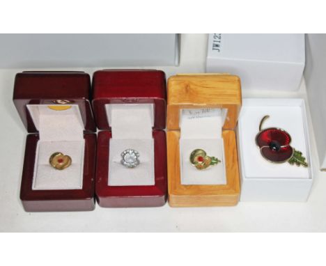 A collection of Royal British Legion boxed Poppy Day items comprising a ceramic mug depicting events of 1916; Paschendale 100