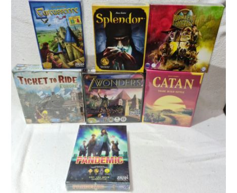Seven sealed board games including Ticket to Ride, Catan, Pandemic etc.  