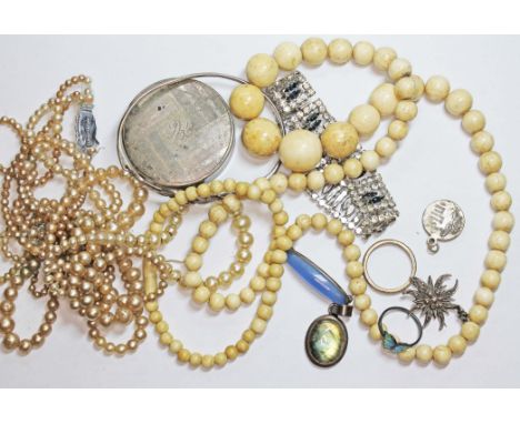 A mixed lot including a hallmarked silver compact, costume jewellery, bone beads, a labradorite pendant, an enamel butterfly 