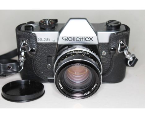 A Rolleiflex SL35 camera together with Weston Master III universal exposure meter  