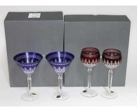 A boxed pair of Waterford Clarendon Cobalt Martini glasses, and a boxed pair of Waterford Clarendon Ruby Hock glassesConditio