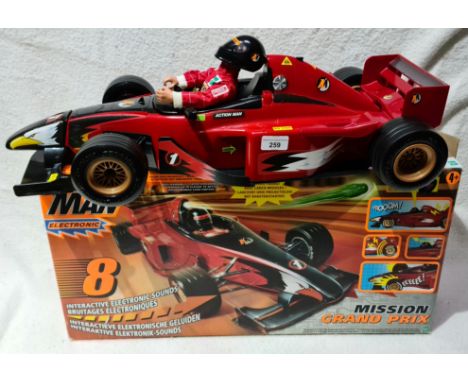 An Action Man Mission Grand Prix F1 car with Action Man driver, in box.  