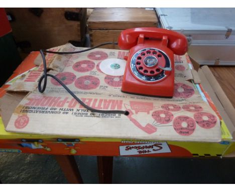 A vintage Mattel-O-Phone USA, and a Simpsons Scalextric