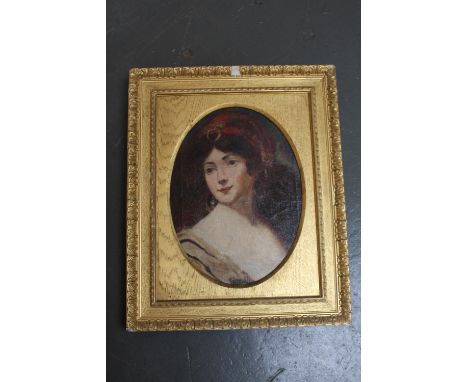 European School, 19th century, Portrait of a woman wearing a red head scarf, framed with oval mount, 30 x 22cm