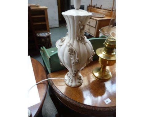A china lamp with applique roses
