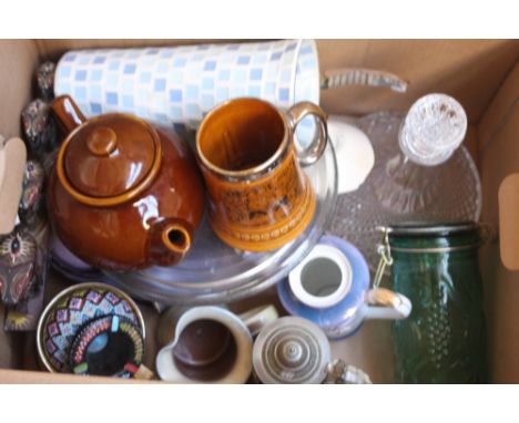 A mixed lot to include a cut glass ships decanter, hand painted wooden elephants, a bluw mosaic glass vase, a jug decorated w
