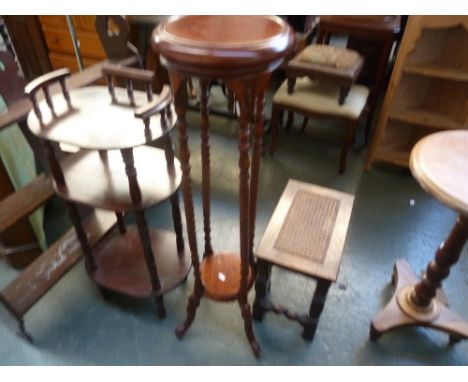 A 20th century mahogany pot stand, with twist legs, with a three shelf unit with turned supports, with an early 20th century 