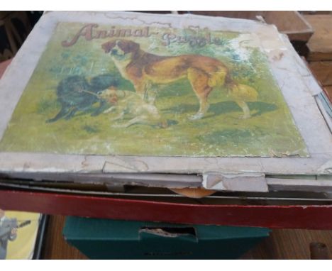 A quantity of vintage games to include 'The Amazing Magic Robot', 'Dinky Doo' game and a Waddingtons 450 piece jigsaw titled 