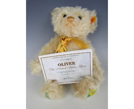 A Steiff Oliver The Musical Spring Teddy Bear, exclusively made for Danbury Mint, with box and certificate of authenticity