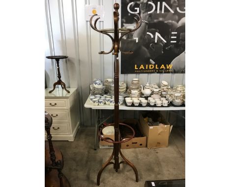 A reproduction mahogany coat and hat stand 