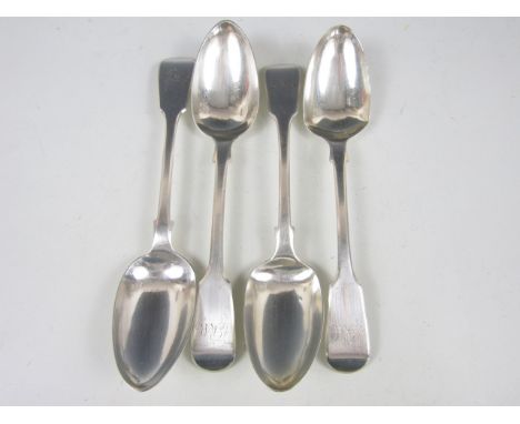 Four Victorian silver fiddle pattern table spoons, London, 1857, 304.8g