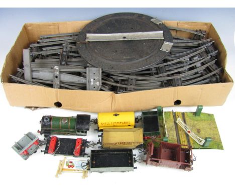 A quantity of vintage Hornby railway rolling stock and track etc